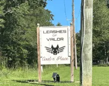 leashes-of-valor-sign