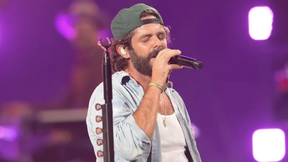 Thomas Rhett performs in West Palm Beach^ Florida on September 4^ 2025. The performance was part of his Better In Boots tour.