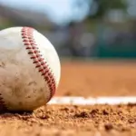 canva-close-up-of-baseball-on-baseball-field-magwtiudaic