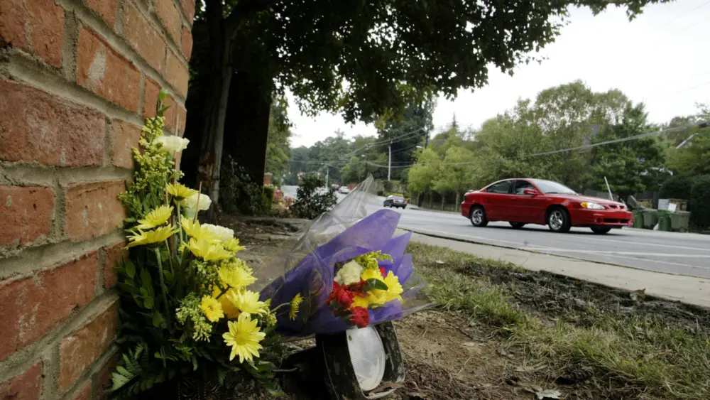 flowers-lay-at-the-scene-of-accident-the-day-after-thrashers-dan-snyderdied-from-injuries-from-car