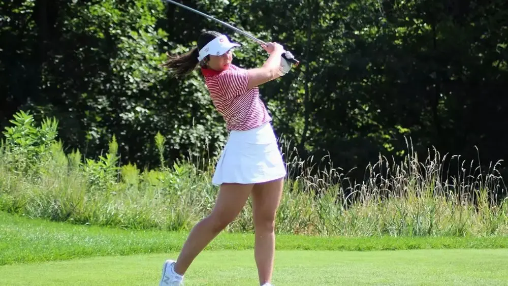 Carter Yurgae competing in Central College golf tournament