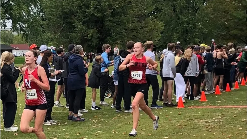 Alexis Sorensen running in Newton Athletics 2024 cross country meet