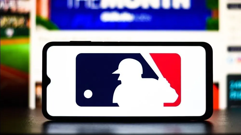 Selective focus of the MLB (Major League Baseball) logo. It is the premier professional baseball league in North America^ featuring top players and teams: Dhaka^ Bangladesh- July 2^ 2023