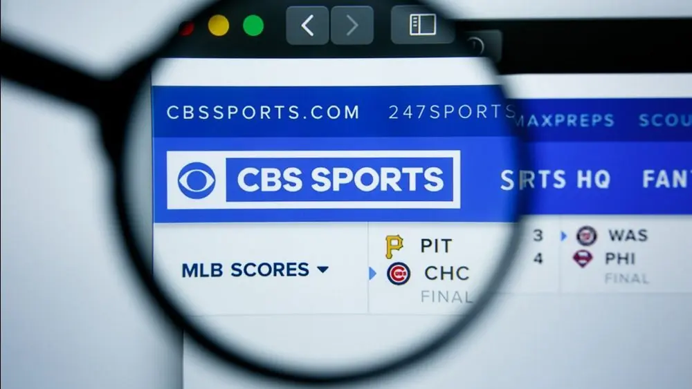 Illustrative Editorial of CBS sports website homepage. CBS sportslogo visible on display screen.