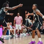 Smith’s Triple-Double Leads Arkansas Past Canadian Champions