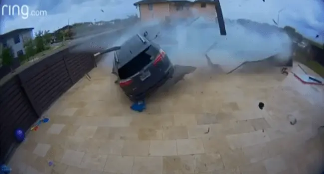 WATCH: SUV Crashes Through Backyard Fence and Skims Family's Swimming ...