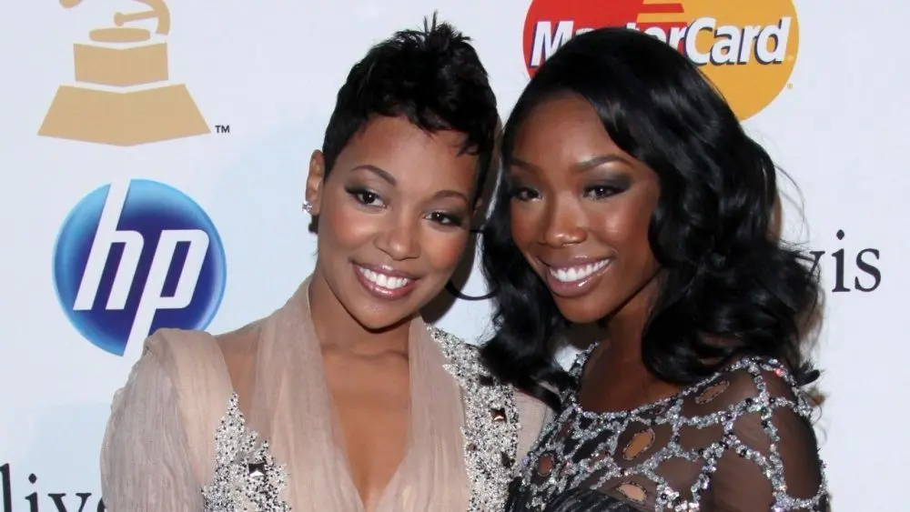 Monica^ Brandy Norwood arrives at the 2011 Pre-GRAMMY Gala And Salute To Industry Icons Beverly Hills^ CA