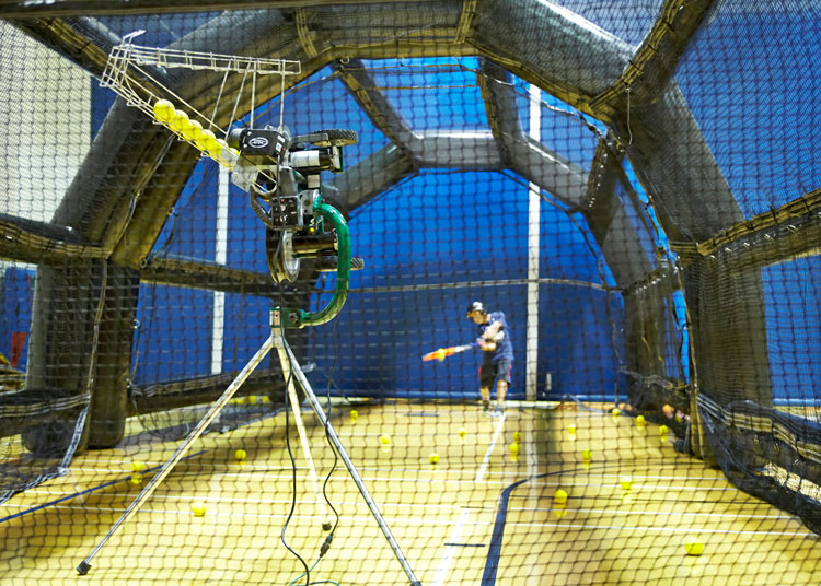 The pitching machine at batting cages used at the YWCA of Greenwich.