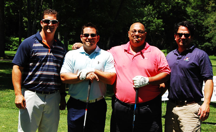 From left, Justin Valenti, Mike DeCarlo, Mike Trangucci and Dave Corbo took the championship at the Boys and Girls Club of Greenwich's annual golf outing at the Griffith E. Harris golf course. 