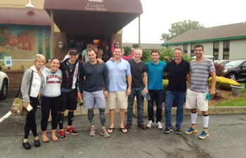 The Greenwich-based Combine Training athletes before the Syracuse Ironman 70.3.