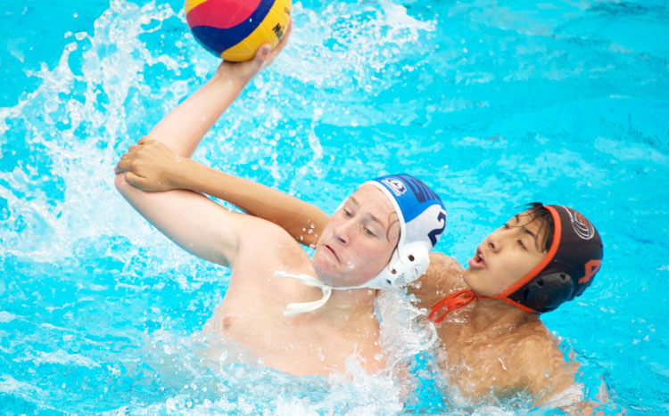 Greenwich Water Polo battles the best during its recent tournament in Montreal, Canada. 