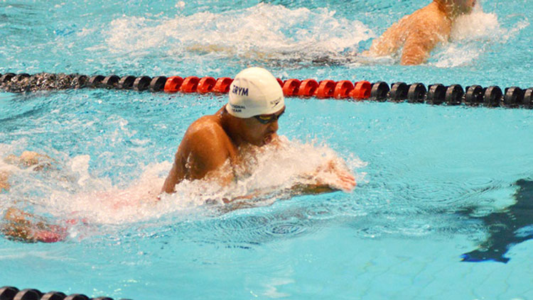 Alex Jahan competing in the 200-yard breaststroke at Junior Nationals.