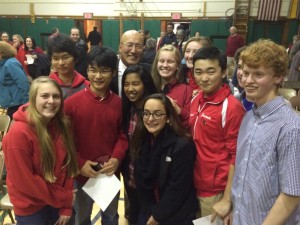 Mr. John Yoon poses with current GHS students at Wednesday night's Board of Ed hearing.