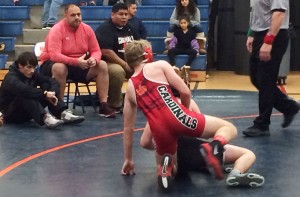 With first-year head coach Greg Domestico looking on, the Greenwich High School wrestling team took to the mat at the Danbury Holiday Tournament. (Evan Triantafilidis photo)