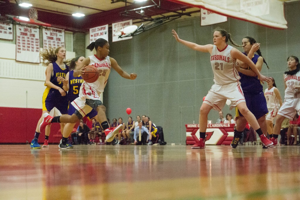 Greenwich's Jayla Faison drives past a defender in a recent game. (John Ferris Robben Photo)