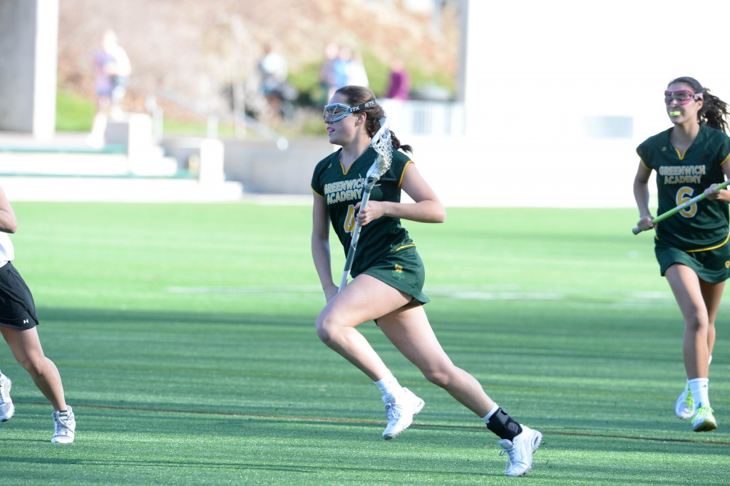 Greenwich Academy's Whitney Balanoff takes the ball up the field in a recent game. (John Ferris Robben Photo)