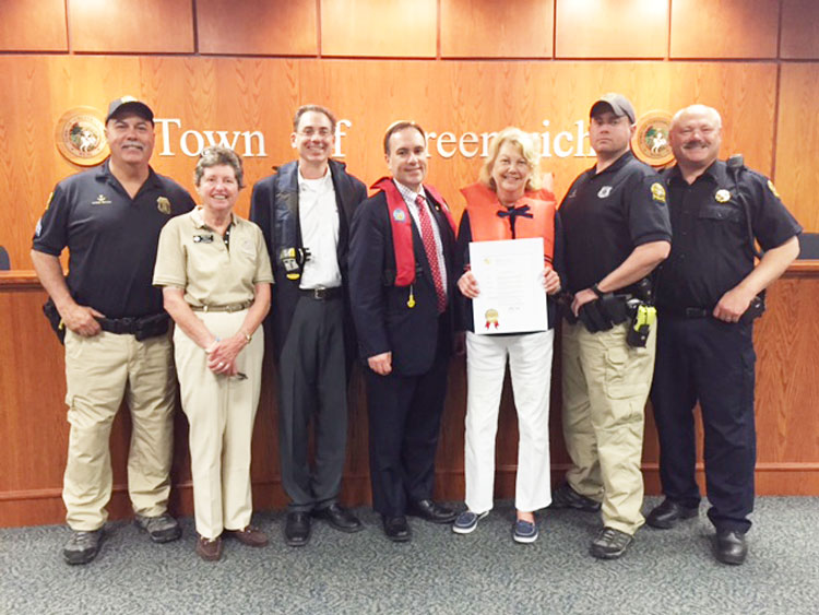 From left: Greenwich Marine Section Sgt. Michael O’Connor Sr., Greenwich Sail & Power Squadron instructors Susan Ryan, Andy Cummings, Greenwich First Selectman Peter Tesei, Nancy York of the Sail & Power Squadron, Greenwich Police Officer Charles Eible and Greenwich Police Marine Section Commander Lt. John Brown. Credit: Barbara Heins.