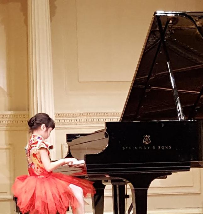 Little Mozart Competition winner, Alessa Rosa, plays piano at Carnegie Hall