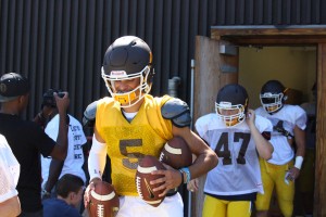 Brunswick quarterback Nick Henkel takes the field in Monday's preseason scrimmage game against Greenwich (Evan Triantafilidis Photo)
