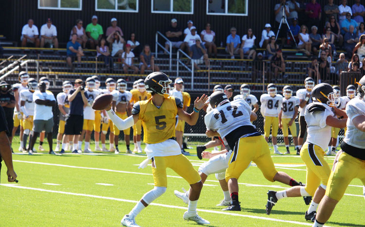 Brunswick School quarterback Nick Henkel fires the ball down the field during a recent scrimmage at Cosby Field. (Evan Triantafilidis photo)