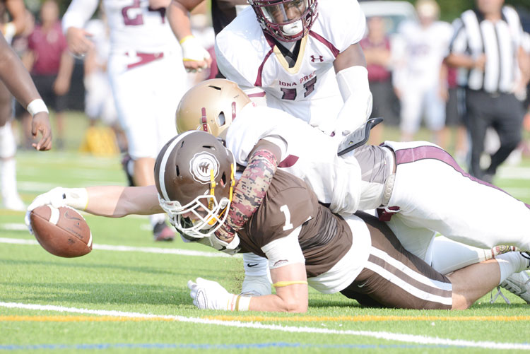 Brunswick School's Sean Morris streches out and finds the end zone during the first quarter of Saturday's game against Iona Prep. (John Ferris Robben photo)