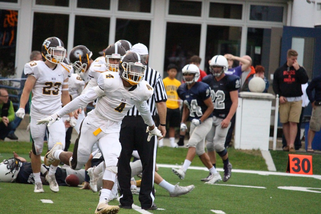 Cameron Kelly celebrates after making an interception in Saturdays game against Kent [Evan Triantafilidis Photo)