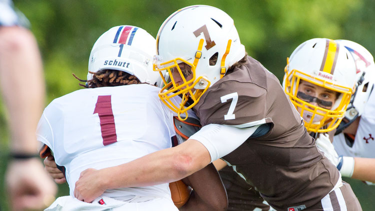 Brunswick School's John Fox makes the tackle on defense during a game last year. (photo courtesy of the Brunswick School athletic department)