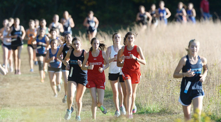 Members of the Greenwich High School girls' cross-country team compete at the FCIAC finals two weeks ago in New Canaan. (John Ferris Robben photo)