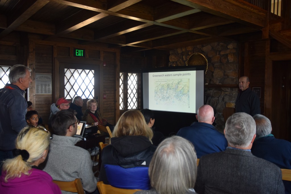 Greenwich Shellfishing Commission Chairman, Roger Bowgen, gives presentation about safe shellfishing and shifts in shellfishing trends over time with guest speaker, Ed, at the Seaside Center during First Sunday Science. Photo by Chéye Roberson.