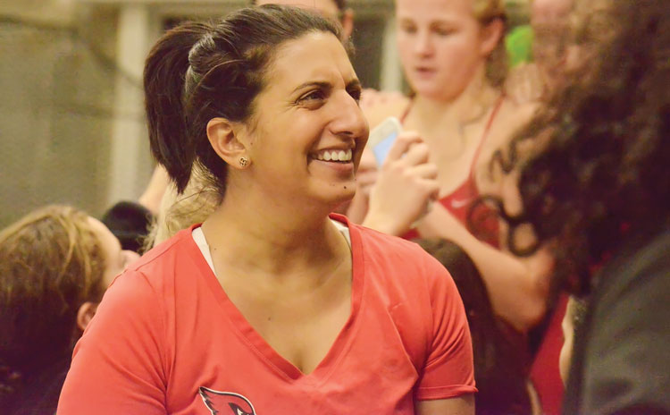 Greenwich High School girls' swim team head coach Lorrie Hokayem is all smiles during a recent meet at the GHS pool. (John Ferris Robben photo)