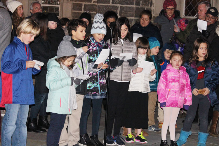 Kids from both Christ Church Greenwichand Temple Sholom came to sing holiday tunes before lighting the Christmas tree and menorah at the annual Interfaith celebration of lights. (contributed photo)