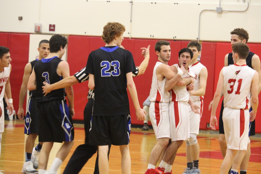 Greenwich defeated Darien 61-58 in overtime on Thursday night (Evan Triantafilidis photo)