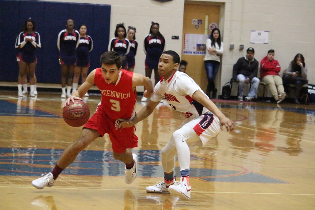 Elias Gianopoulos drives to the basket in Friday's win over McMahon (Evan Triantafilidis photo)