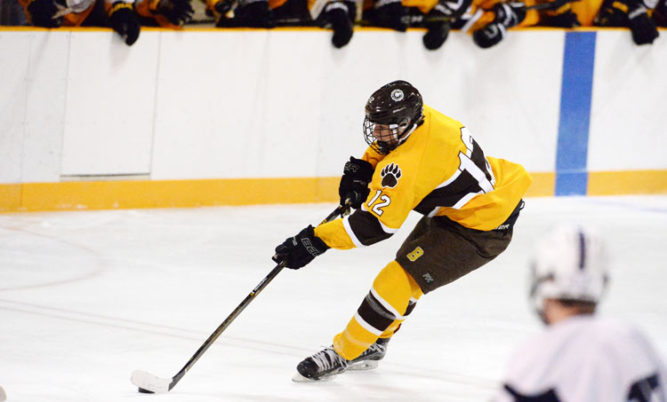 Brunswick School senior captain Nick VanBelle darts down the ice during Monday's game at the Hartong Rink. VanBelle scored the OT winner against Hotchkiss. (John Ferris Robben photo)