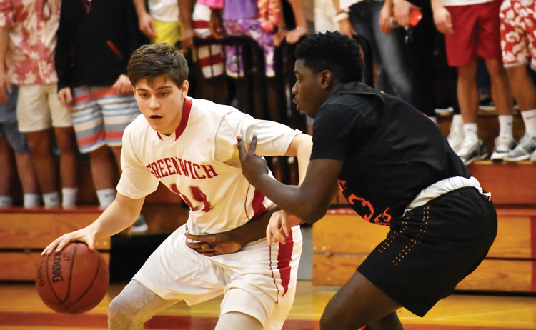 Greenwich High School senior captain Robert Clark looks to get past his Stamford defender during Tuesday night's victory. (Paul Silverfarb photo)