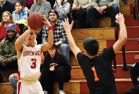 Big Red junior Elias Gianopoulos fires off the shot during Tuesday's victory against Stamford High School. (Paul Silverfarb photo)