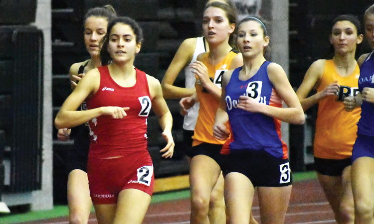 Greenwich High School junior Emily Philippides races to the front of the pack during last Thursday's FCIAC championship meet at the New Haven Athletic Center. (Paul Silverfarb photo)