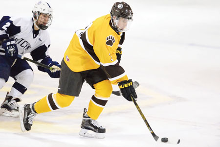 Brunswick School sophomore defender Henry Hill races down the ice during a recent game. (John Ferris Robben photo)