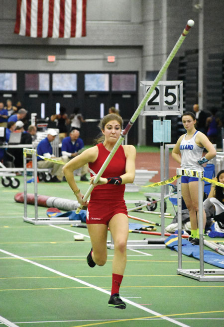 Greenwich High School junior Lia Zavattaro darts to a third place finish in the pole vault during Monday's CIAC state open championship meet. (Paul Silverfarb photo)