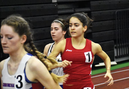 Greenwich's Emily Philippides takes to the 1,000-meter run during Monday's CIAC state open finals. (Paul Silverfarb photo)
