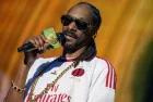 SNOOP DOGG famous singer performs singing on stage famous singer performs on stage singing a well known festival in ITALY