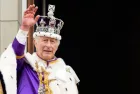 King Charles III on the balcony of Buckingham Palace following the Coronation at Westminster Abbey on May 6^ 2023 in London^ England
