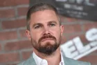 Stephen Amell arrives for the STARZ 'Heels' Los Angeles Premiere on August 08^ 2021 in Los Angeles^ CA