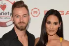 Artem Chigvintsev^ Nikki Bella at the 9th Annual Variety Charity Poker & Casino Night at the Paramount Studios on July 24^ 2019 in Los Angeles^ CA