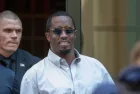 Sean “Diddy” Combs exiting the Crosby Street Hotel and heading to a waiting line of black SUV's. Lower Manhattan NYC^ New York / USA - July 24^ 2019
