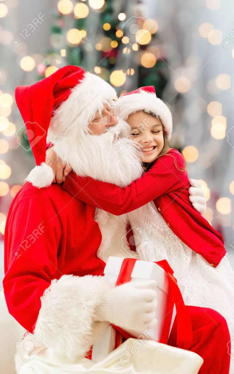 32781084-smiling-little-girl-hugging-with-santa-claus-over-christmas-tree-lights-background-jpg-4