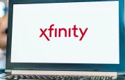 Laptop computer displaying logo of Xfinity^ the trade name of Comcast Cable Communications^ LLC to market consumer cable television^ internet^ telephone.
