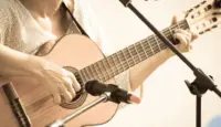 Woman with guitar/toned photo