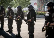 Minneapolis^ Minnesota / USA - May 29 2020: close up state patrol police officers standing guard towards minneapolis riots for George Floyd