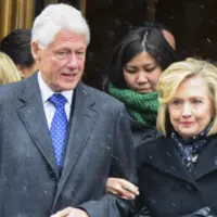Bill & Hillary Clinton at funeral services held for former New York governor Mario Cuomo at St. Ignatius Loyola Church on Manhattan's Upper East Side. NEW YORK CITY - JANUARY 6 2015